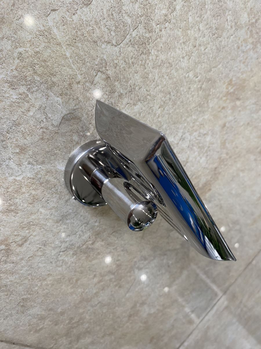 Kệ xà phòng inox  áp sát vào tường